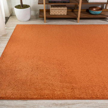 Haze Solid Low-pile Area Rug Orange